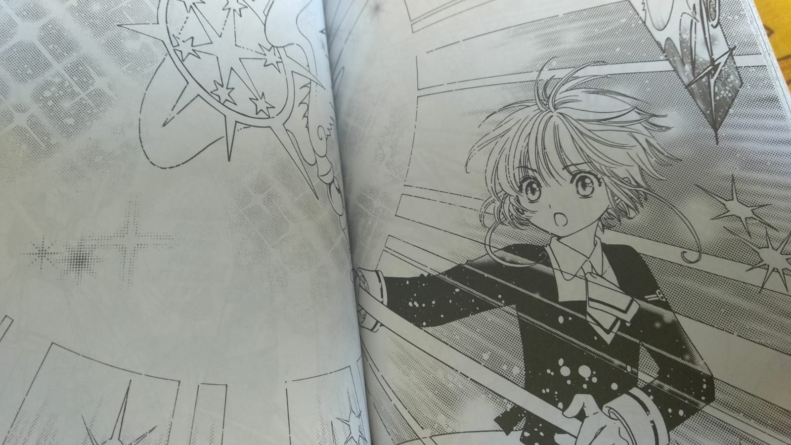 Review manga Cardcaptor Sakura Clear Card Arc 1 2